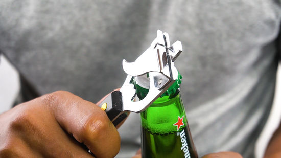 Use a piece of flat metal for opening can